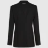 Blazer met contrasterende revers en riem