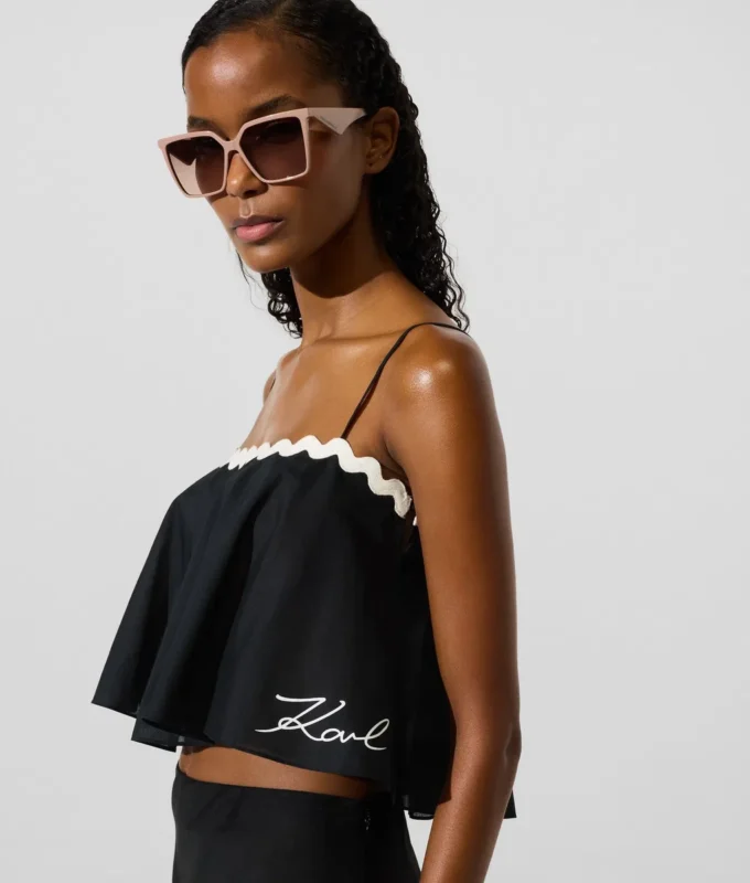 Cropped strandtop met geschulpte rand