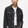 Denim jasje met vetersluiting