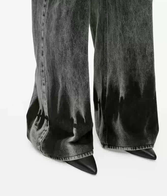 Gebleekte laag uitgesneden jeans met wijde pijpen