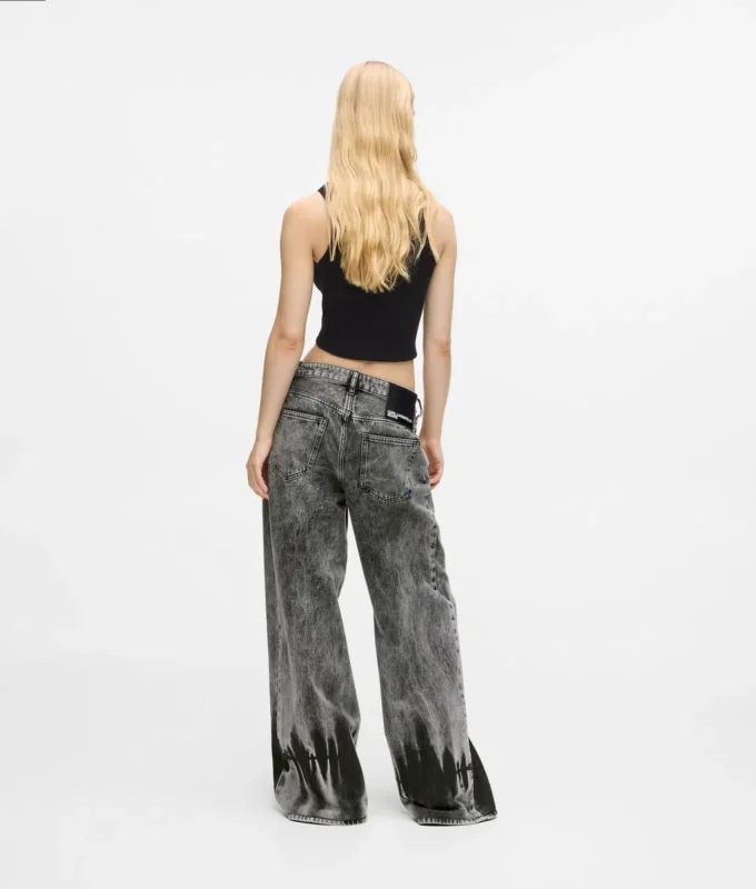 Gebleekte laag uitgesneden jeans met wijde pijpen