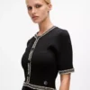 Gebreide jurk met bouclé-details