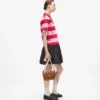 Ikon crossbodytas met kiezelmotief
