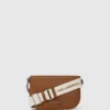 Ikon crossbodytas met kiezelmotief