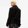 Jas met knoopdetails