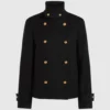 Jas met knoopdetails