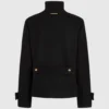 Jas met knoopdetails