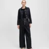 JEANS MET KNOPEN EN WIJDE PIJPEN
