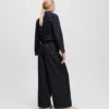 JEANS MET KNOPEN EN WIJDE PIJPEN