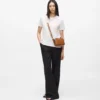 K/CIRCLE PERFORATED CROSSBODY BAG