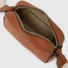K/CIRCLE PERFORATED CROSSBODY BAG