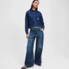 LAGE TAILLE JEANS MET WIJDE PIJP