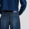 LAGE TAILLE JEANS MET WIJDE PIJP