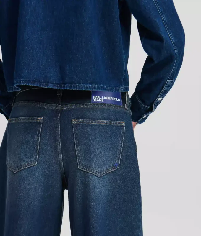 LAGE TAILLE JEANS MET WIJDE PIJP