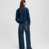 LAGE TAILLE JEANS MET WIJDE PIJP