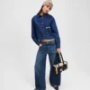 LAGE TAILLE JEANS MET WIJDE PIJP