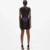 Leren jurk met knoopdetails