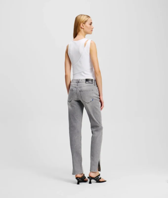 MID-RISE SLIM FIT JEANS MET SPLIT-HEM