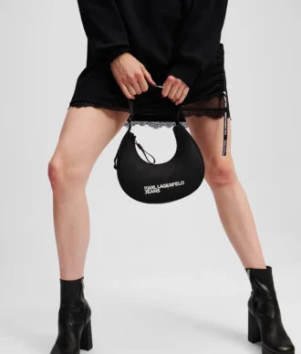 Nylon schoudertas met logo en maanmotief