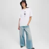 PLISSÉ JEANS MET WIJDE PIJP