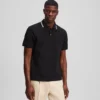 POLOSHIRT MET CONTRASTERENDE BIJZONDERHEDEN