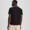 POLOSHIRT MET CONTRASTERENDE BIJZONDERHEDEN