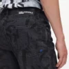 Rechte jeans met monogram over de hele lengte
