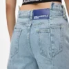 Relaxte jeans met naad en middelhoge taille