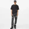 Relaxte jeans met verfeffect