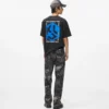 Relaxte jeans met verfeffect