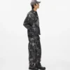 Relaxte jeans met verfeffect