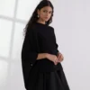 RIBGEBREIDE PONCHO