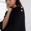 RIBGEBREIDE PONCHO