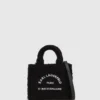 Rue St-Guillaume mini-shearling draagtas