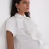 SHIRT MET KORTE MOUWEN EN RUFFLES