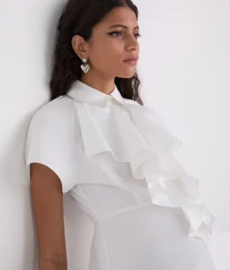 SHIRT MET KORTE MOUWEN EN RUFFLES
