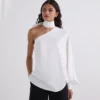 SHIRT MET ÉÉN MOUW EN STRIKDETAIL