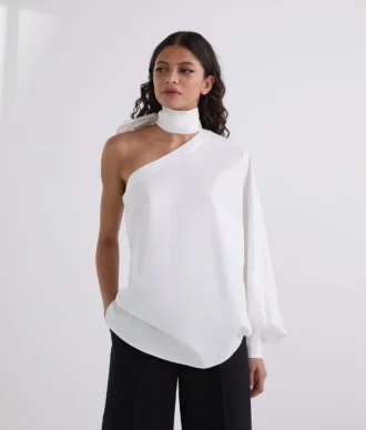 SHIRT MET ÉÉN MOUW EN STRIKDETAIL