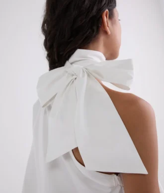 SHIRT MET ÉÉN MOUW EN STRIKDETAIL