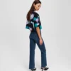 STRAIGHT JEANS MET SPLIT-HEM EN HOGE TAILLE