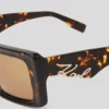 SUNGLASSES MET UITGESNEDEN SIGNATURE
