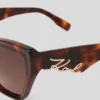 SUNGLASSES MET UITGESNEDEN SIGNATURE