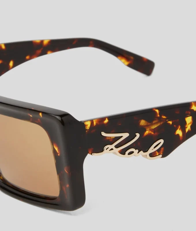 SUNGLASSES MET UITGESNEDEN SIGNATURE