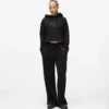 Sweatpants met studs en monogram