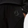 Sweatpants met studs en monogram