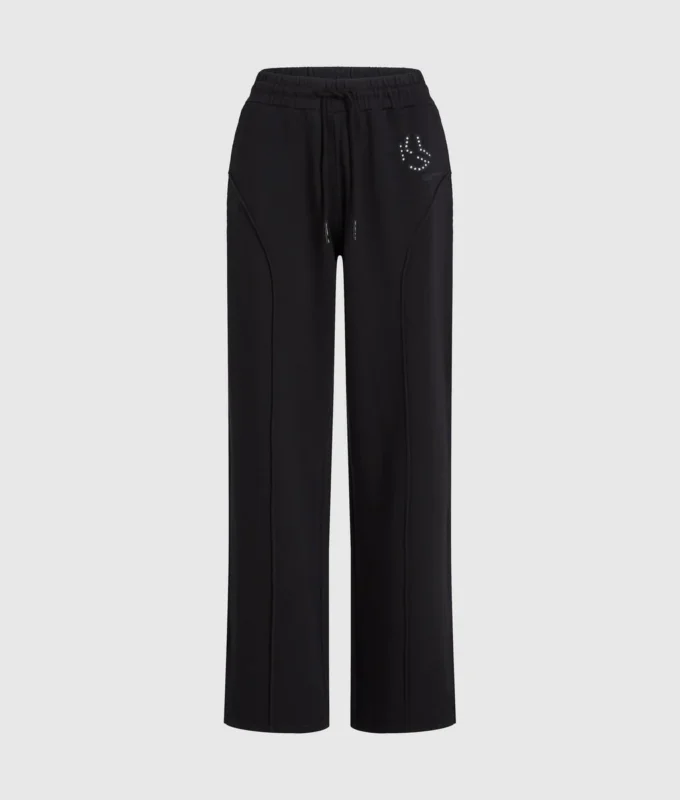 Sweatpants met studs en monogram
