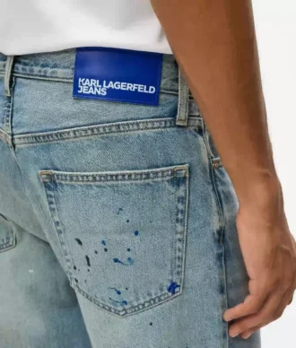 Taps toelopende jeans met verfspatten