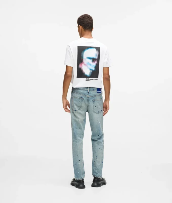 Taps toelopende jeans met verfspatten