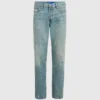 Taps toelopende jeans met verfspatten