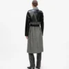 Tweed en imitatieleer jas